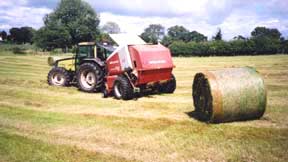 Contractor baling silage